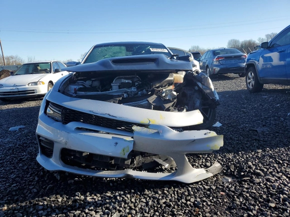 2022 Dodge Charger SRT Hellcat Widebody z VIN 2C3CDXL98NH159571, wystawiony jako Copart lot #87457204 z przebiegiem 15 828 mil mil oraz Szkoda całkowita • Salvage title. Historia ofert i sprzedaży dostępna na DreamBid. Obrazek 5.