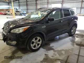 2016 Ford Escape SE with VIN 1FMCU9GX1GUC24692, listed as a Copart auction lot 88102815 with 114,900 mi miles and Salvage Title. Bid and sale history available at DreamBid. Image 1.