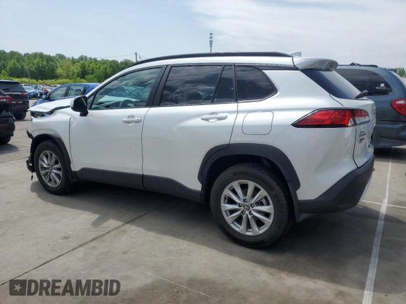 2023 Toyota Corolla Cross LE with VIN 7MUCAAAG2PV053730, listed as a Copart auction lot 54825035 with 33,313 mi miles and Salvage title. Bid and sale history available at DreamBid. Image 2.