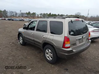 2001 Mazda Tribute LX with VIN 4F2YU08121KM45088, listed as a IAAI auction lot 41693962 with 136,121 mi miles and . Bid and sale history available at DreamBid. Image 3.