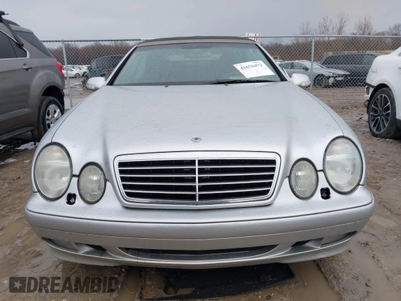2003 Mercedes-Benz CLK 320 z VIN WDBLK65G33T141954, wystawiony jako IAAI lot #41676472 z przebiegiem 68 041 mil mil oraz . Historia ofert i sprzedaży dostępna na DreamBid. Obrazek 12.