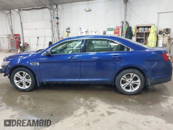 2013 Ford Taurus SEL with VIN 1FAHP2E82DG149828, listed as a IAAI auction lot 41910513 with 130,594 mi miles and . Bid and sale history available at carsss.com. Image 15.
