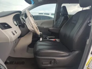 2013 Toyota Sienna SE with VIN 5TDXK3DC5DS332680, listed as a Copart auction lot 62996265 with 185,332 mi miles and Clean title. Bid and sale history available at DreamBid. Image 7.