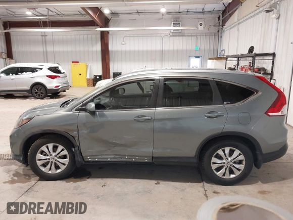 2012 Honda CR-V EX-L with VIN JHLRM4H70CC020419, listed as a IAAI auction lot 41814998 with 99,777 mi miles. Bid and sale history available at carsss.com. Image 15.