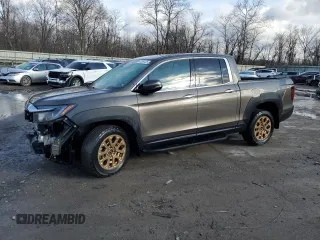 2022 Honda Ridgeline RTL-E with VIN 5FPYK3F74NB003101, listed as a Copart auction lot 47084125 with 42,611 mi miles and Salvage Title. Bid and sale history available at DreamBid. Image 1.