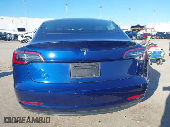 2023 Tesla Model 3 with VIN 5YJ3E1EA6PF505252, listed as a IAAI auction lot 41380172 with 31,141 mi miles and . Bid and sale history available at DreamBid. Image 15.