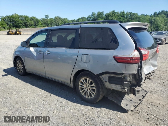 2016 Toyota Sienna XLE with VIN 5TDYK3DC0GS752355, listed as a Copart auction lot 61857925 with 146,949 mi miles and Salvage title. Bid and sale history available at DreamBid. Image 2.