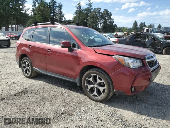 2014 Subaru Forester XT Touring with VIN JF2SJGMC0EH513844, listed as a Copart auction lot 61162355 with 56,887 mi miles and Salvage title. Bid and sale history available at DreamBid. Image 4.