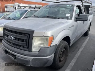 2014 Ford F-150 XL with VIN 1FTMF1CM6EKD55559, listed as a IAAI auction lot 42165710 with 270,953 mi miles. Bid and sale history available at carsss.com. Image 1.