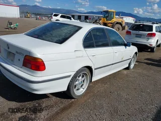 1997 BMW 5 Series 540i z VIN WBADE6327VBW53212, wystawiony jako IAAI lot #42310586 z przebiegiem Nie podano mil oraz . Historia ofert i sprzedaży dostępna na DreamBid. Obrazek 4.