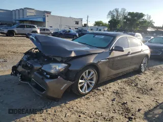 2014 BMW 6 Series 640i z VIN WBA6A0C58EDZ04545, wystawiony jako Copart lot #71086984 z przebiegiem 99 048 mil mil oraz Szkoda całkowita • Salvage title. Historia ofert i sprzedaży dostępna na DreamBid. Obrazek 1.