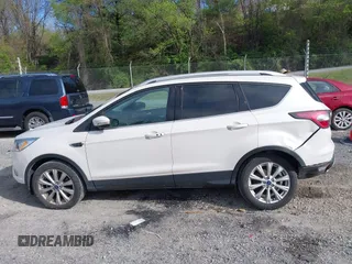 2017 Ford Escape Titanium with VIN 1FMCU9JD9HUB40135, listed as a IAAI auction lot 42054533 with 68,255 mi miles. Bid and sale history available at carsss.com. Image 14.