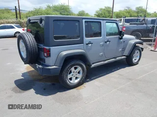 2016 Jeep Wrangler Unlimited Freedom with VIN 1C4BJWDG7GL109953, listed as a IAAI auction lot 42140111 with 24,570 mi miles and . Bid and sale history available at DreamBid. Image 4.
