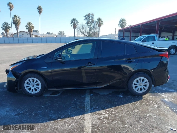 2019 Toyota Prius L Eco with VIN JTDKARFU9K3090948, listed as a IAAI auction lot 41400008 with 113,323 mi miles. Bid and sale history available at carsss.com. Image 14.