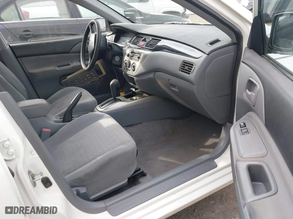 2004 Mitsubishi Lancer ES with VIN JA3AJ26E74U060371, listed as a IAAI auction lot 41636927 with 165,456 mi miles. Bid and sale history available at carsss.com. Image 5.