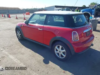 2010 MINI Hardtop with VIN WMWMF3C56ATZ61062, listed as a IAAI auction lot 42241846 with 79,593 mi miles and . Bid and sale history available at DreamBid. Image 3.