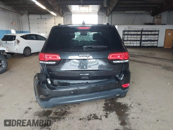 2015 Jeep Grand Cherokee Limited with VIN 1C4RJFBG4FC611156, listed as a IAAI auction lot 42021705 with 137,887 mi miles. Bid and sale history available at carsss.com. Image 16.