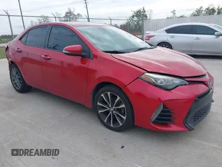 2017 Toyota Corolla L z VIN 5YFBURHE9HP610157, wystawiony jako IAAI lot #40999523 z przebiegiem 185 454 mil mil oraz . Historia ofert i sprzedaży dostępna na DreamBid. Obrazek 1.