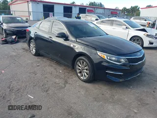 2018 Kia Optima LX with VIN 5XXGT4L38JG256924, listed as a IAAI auction lot 41267413 with 129,820 mi miles and . Bid and sale history available at DreamBid. Image 1.