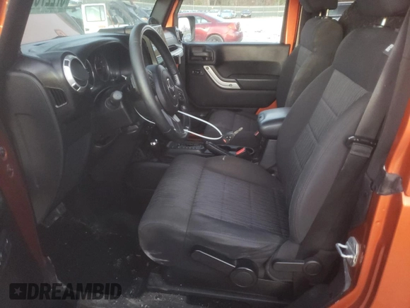 2011 Jeep Wrangler Sahara with VIN 1J4GA5D11BL627667, listed as a Copart auction lot 87227054 with 124,009 mi miles and Clean Title. Bid and sale history available at DreamBid. Image 7.