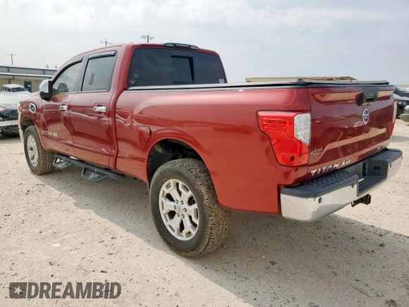 2016 Nissan Titan SL z VIN 1N6BA1F4XGN500750, wystawiony jako Copart lot #57608135 z przebiegiem 126 525 mil mil oraz Czysty tytuł • Clean title. Historia ofert i sprzedaży dostępna na DreamBid. Obrazek 2.