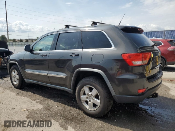 2011 Jeep Grand Cherokee Laredo z VIN 1J4RR4GG2BC518713, wystawiony jako Copart lot #55947995 z przebiegiem 119 783 mil mil oraz Szkoda całkowita • Salvage title. Historia ofert i sprzedaży dostępna na DreamBid. Obrazek 2.