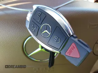 2002 Mercedes-Benz E-Class with VIN WDBJF65J62B404868, listed as a IAAI auction lot 42121837 with 107,415 mi miles. Bid and sale history available at carsss.com. Image 11.