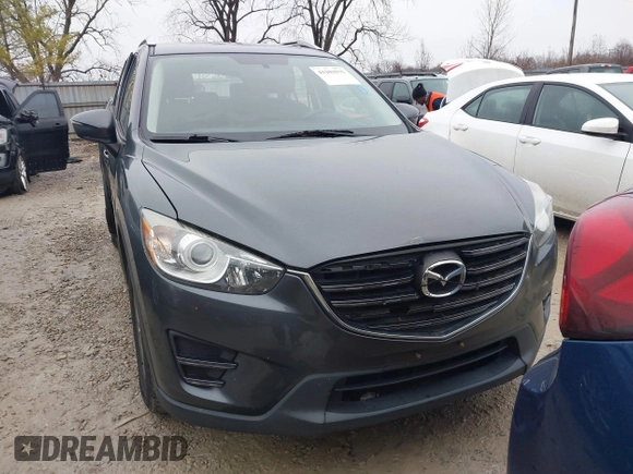 2016 Mazda CX-5 Sport with VIN JM3KE4BY5G0885754, listed as a IAAI auction lot 41103575 with 136,263 mi miles and . Bid and sale history available at carsss.com. Image 13.