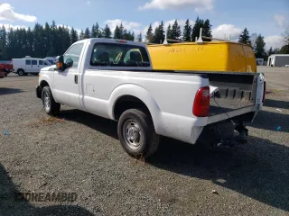 2015 Ford Super Duty F-250 SRW XL with VIN 1FTBF2A63FEC72804, listed as a Copart auction lot 73575644 with 144,899 mi miles and Salvage Title. Bid and sale history available at carsss.com. Image 2.