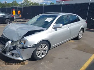 2008 Toyota Avalon XL with VIN 4T1BK36B48U312044, listed as a IAAI auction lot 40394391 with 197,886 mi miles. Bid and sale history available at carsss.com. Image 2.