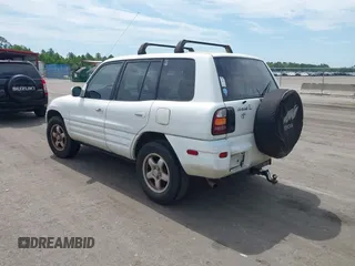 1999 Toyota RAV4 with VIN JT3GP10V8X7054552, listed as a IAAI auction lot 42361645 with 266,630 mi miles and . Bid and sale history available at DreamBid. Image 3.