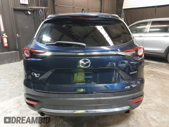 2020 Mazda CX-9 Grand Touring with VIN JM3TCBDY4L0403376, listed as a IAAI auction lot 42357363 with 86,716 mi miles and . Bid and sale history available at DreamBid. Image 16.