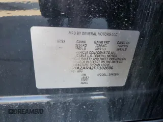 2023 Cadillac XT4 FWD Luxury z VIN 1GYAZAR42PF102696, wystawiony jako Copart lot #85540204 z przebiegiem 1 903 mil mil oraz Szkoda całkowita • Salvage title. Historia ofert i sprzedaży dostępna na DreamBid. Obrazek 13.