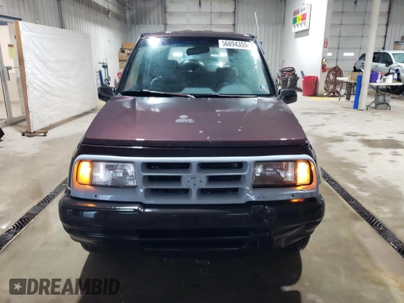 1998 Chevrolet Tracker z VIN 2CNBJ1362W6919635, wystawiony jako Copart lot #56894355 z przebiegiem 140 298 mil mil oraz Szkoda całkowita • Salvage title. Historia ofert i sprzedaży dostępna na DreamBid. Obrazek 5.
