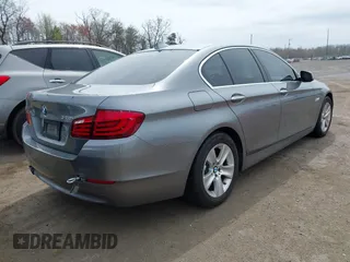 2013 BMW 5 Series 528i xDrive with VIN WBAXH5C55DD111408, listed as a IAAI auction lot 41954630 with 126,704 mi miles. Bid and sale history available at carsss.com. Image 4.