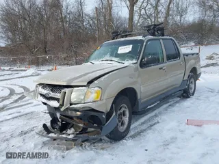 2003 Ford Explorer Sport Trac XLS with VIN 1FMZU77E33UA31967, listed as a IAAI auction lot 41607832 with 144,528 mi miles. Bid and sale history available at carsss.com. Image 2.