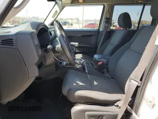 2010 Jeep Commander Sport with VIN 1J4RG4GKXAC121954, listed as a Copart auction lot 51965925 with 144,115 mi miles and Salvage title. Bid and sale history available at DreamBid. Image 7.