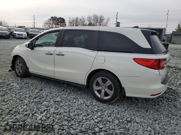 2019 Honda Odyssey EX-L with VIN 5FNRL6H72KB014960, listed as a Copart auction lot 48701035 with 131,921 mi miles and Salvage Title. Bid and sale history available at carsss.com. Image 2.