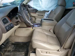 2012 Chevrolet Tahoe LTZ with VIN 1GNSKCE08CR322969, listed as a Copart auction lot 50604555 with 165,190 mi miles and Salvage title. Bid and sale history available at DreamBid. Image 7.