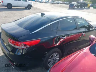 2016 Kia Optima LX with VIN 5XXGT4L31GG022844, listed as a IAAI auction lot 41240100 with 121,586 mi miles and . Bid and sale history available at DreamBid. Image 4.