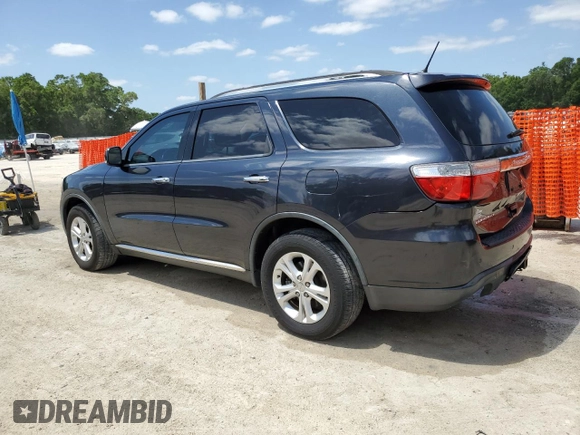 2013 Dodge Durango Crew with VIN 1C4SDHDT3DC679153, listed as a Copart auction lot 54472645 with 167,068 mi miles and Salvage Title. Bid and sale history available at DreamBid. Image 2.