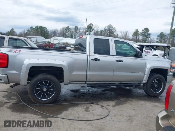 2014 Chevrolet Silverado 1500 Work Truck with VIN 1GCVKPEHXEZ210955, listed as a IAAI auction lot 41843645 with 267,582 mi miles and . Bid and sale history available at DreamBid. Image 13.