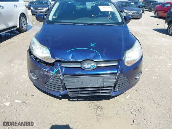 2012 Ford Focus SE with VIN 1FAHP3F20CL153513, listed as a IAAI auction lot 41802521 with 139,859 mi miles. Bid and sale history available at carsss.com. Image 6.