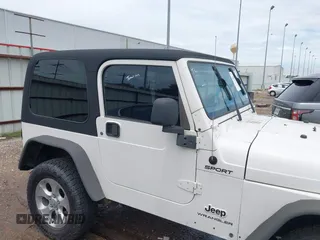 2003 Jeep Wrangler Sport with VIN 1J4FA49S43P362339, listed as a IAAI auction lot 41452901 with 208,128 mi miles and . Bid and sale history available at DreamBid. Image 14.