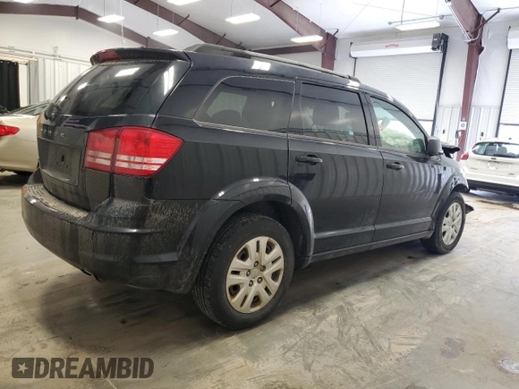 2017 Dodge Journey SE with VIN 3C4PDCAB4HT704902, listed as a Copart auction lot 51410815 with 153,976 mi miles and Salvage Title. Bid and sale history available at DreamBid. Image 3.