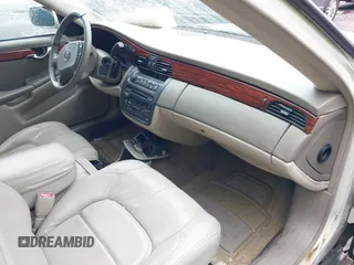 2004 Cadillac DeVille z VIN 1G6KD54Y04U208052, wystawiony jako IAAI lot #42190581 z przebiegiem 163 294 mil mil oraz . Historia ofert i sprzedaży dostępna na DreamBid. Obrazek 5.