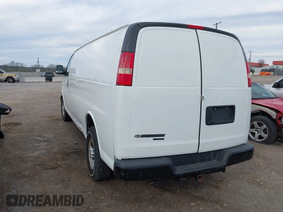 2014 Chevrolet Express Cargo Van with VIN 1GCWGGCA4E1209164, listed as a IAAI auction lot 41838141 with 174,770 mi miles. Bid and sale history available at carsss.com. Image 3.
