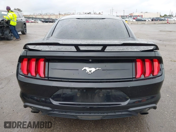 2018 Ford Mustang EcoBoost z VIN 1FA6P8TH3J5129088, wystawiony jako IAAI lot #41792548 z przebiegiem 55 991 mil mil oraz . Historia ofert i sprzedaży dostępna na DreamBid. Obrazek 16.