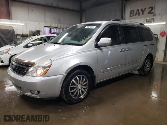 2012 Kia Sedona EX with VIN KNDMH4C7XC6483296, listed as a Copart auction lot 76624984 with 203,980 mi miles and Salvage Title. Bid and sale history available at carsss.com. Image 1.