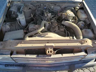 1986 Chevrolet Blazer z VIN 1G8CT18RXG8180574, wystawiony jako Copart lot #87987925 z przebiegiem 82 571 mil mil oraz Szkoda całkowita • Salvage title. Historia ofert i sprzedaży dostępna na DreamBid. Obrazek 12.